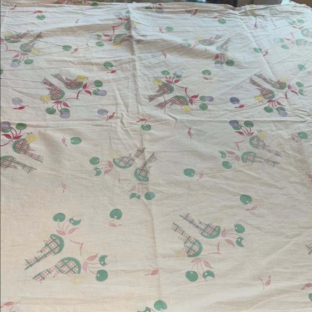 Vintage crib sheet with birds and cherries
